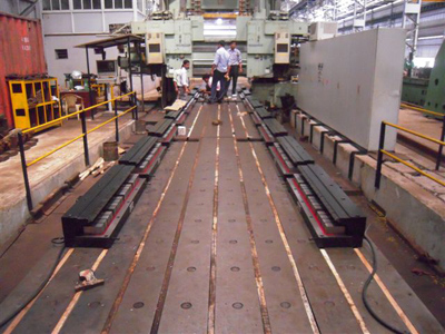 Installation of 16 magnets on a double column rail machining centre