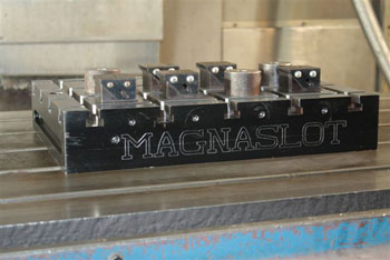 Magnaslot with spring blocks for clamping of rough jobs